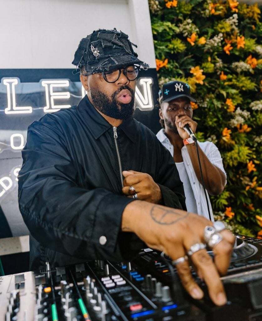 DJ mixing music at outdoor event